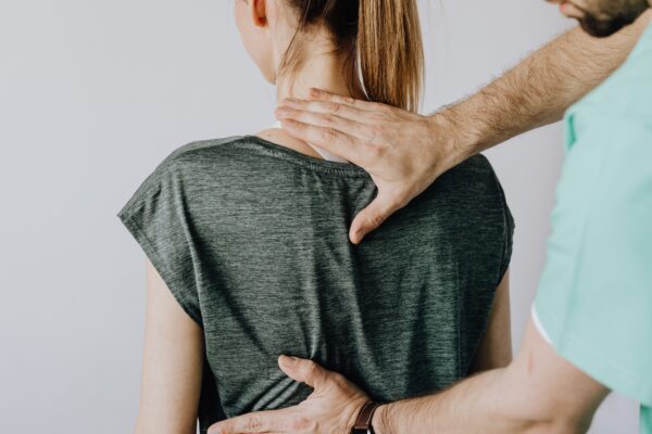 Chiropractor performing a hands-on spinal adjustment — Saint Paul Park MN