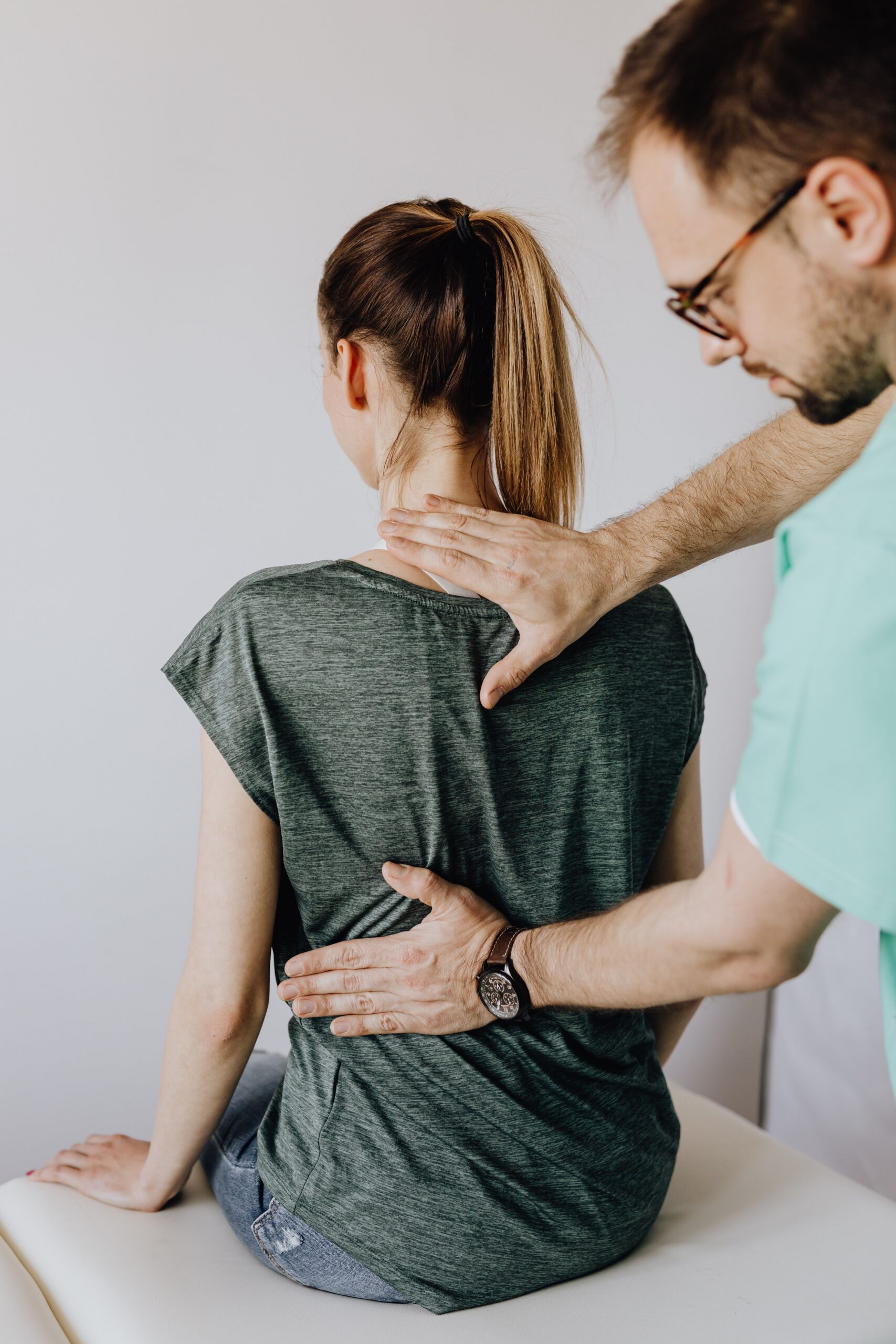 Chiropractor performing a hands-on spinal adjustment — Saint Paul Park MN
