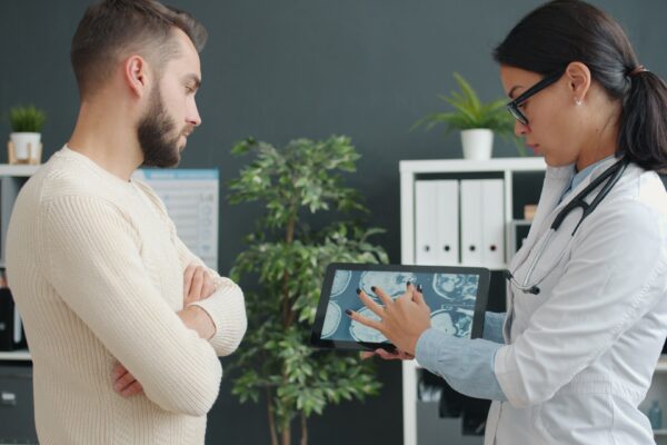 Clinician reviewing options with a patient during consultation — choosing the right provider, Saint Paul Park MN