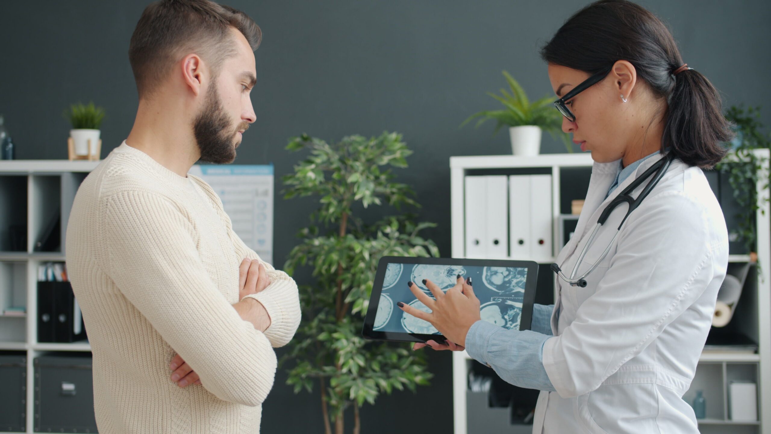 Clinician reviewing options with a patient during consultation — choosing the right provider, Saint Paul Park MN