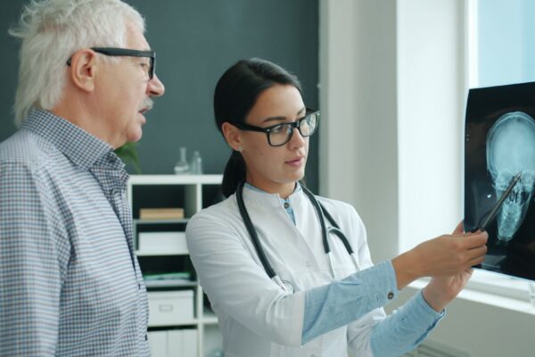 Doctor reviewing imaging results with a patient — when imaging is actually needed, Saint Paul Park MN