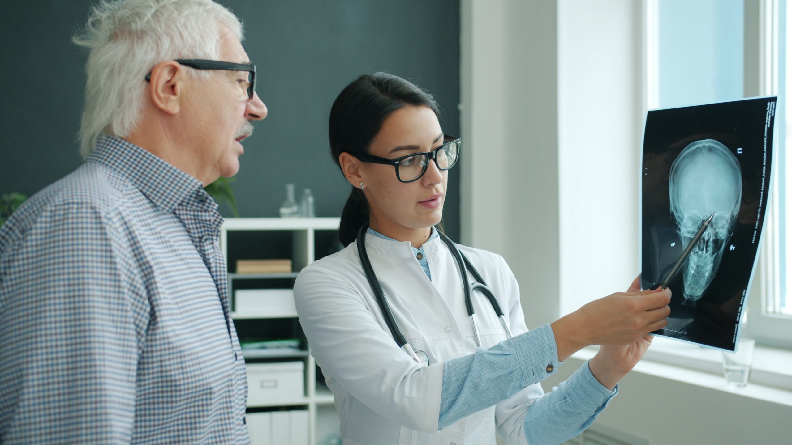 Doctor reviewing imaging results with a patient — when imaging is actually needed, Saint Paul Park MN